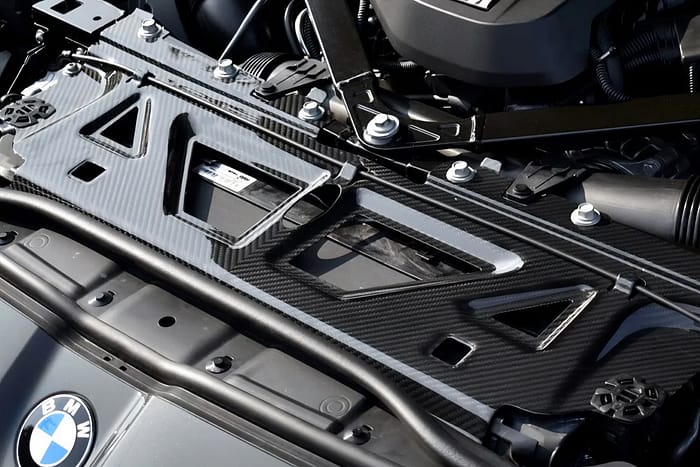 Slam panel din fibră de carbon pentru BMW M4 G82 – capac compartiment motor, design OEM și finisaj premium by ASM Tuning